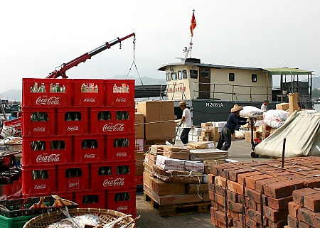 Unloading a cargo boat in Cheung Chau harbour