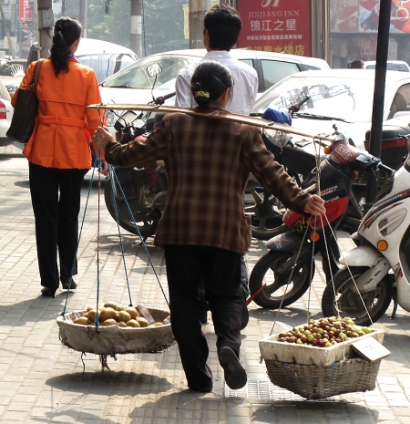Don't feel sorry for the Japanese office lady - look at the sort of work women have to do in China! 