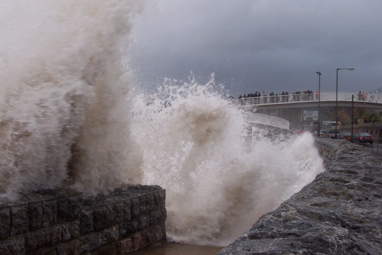 The stormy conditions attract large crowds of onlookers