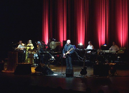 Brendan Perry sings and plays the guitar while Lisa Gerrard assists with percussion