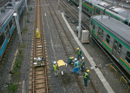 Rail workers repairing tracks North of Ueno station