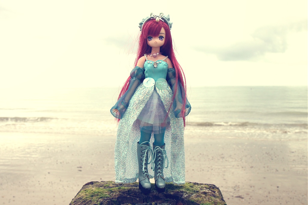 Artistic photograph of Azone Pureneemo BJD mermaid Aika at the seaside