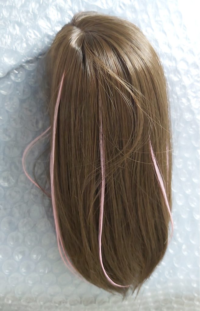 Dollfie Dream Sister Kizuna AI wig with pink highlights